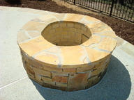 Stone Outdoor Fire Pit with Retaining Wall